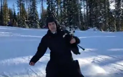 Watch This Priest Ski While Playing The Bagpipes