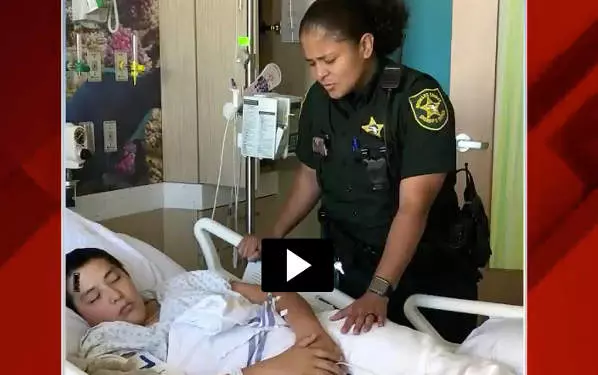 Brenda Louis Deputy Prays With Victims Of School Shooting