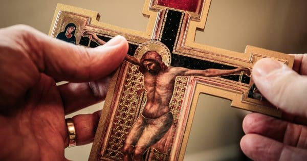 why do catholics worship statues and icons